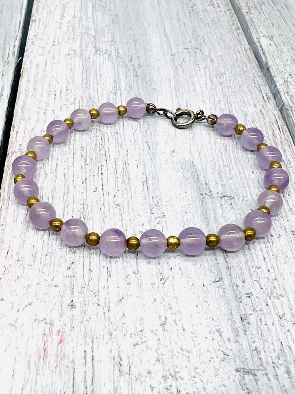 504. Vintage Polished Amethyst and Bronze Bead Bracelet 7 5/8”